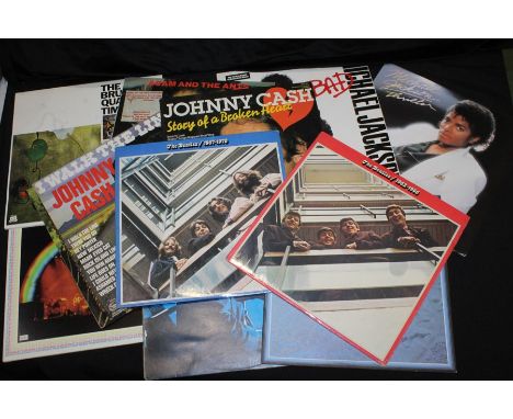 28 x Mixed LPs, 2 x 7'' singles, 5 x Country CDs. To include, The Beatles(2)  - 1962-66 and 1967-70, Michael Jackson(2) -  Ba