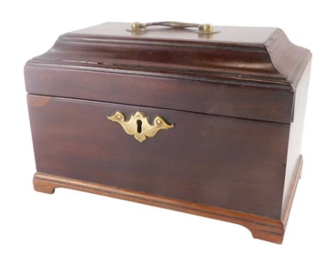 A mahogany tea caddy with brass mounts, the hinged lid enclosing a vacant interior, 33cm wide.