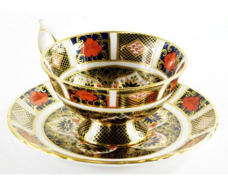 A Royal Crown Derby 1128 Imari pattern cup and saucer.