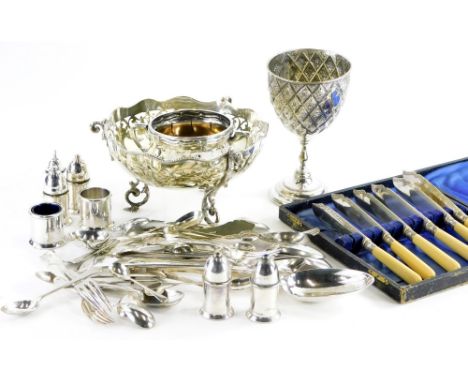 A collection of silver plate, to include a Victorian goblet with Gothic decoration, a pierced centrepiece, cutlery, etc.