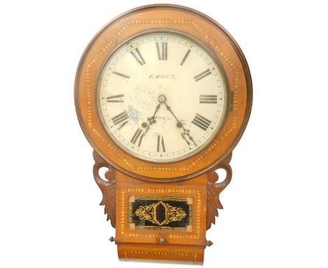 A late 19thC walnut and parquetry American drop dial wall clock, the painted dial stamped F Howe Hull above a glazed verre eg