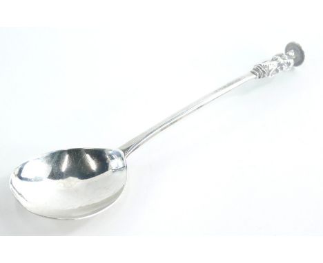 An early 18thC silver apostle spoon, possibly of St Simon the Zealotes, marks indistinct, maker RC, 1¬oz.