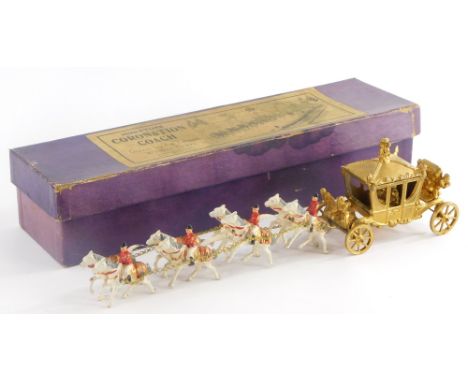A mid 20thC Johillco series miniature lead coronation coach, pulled by an arrangement of horses, 30cm long, boxed. 