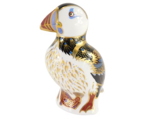 A Royal Crown Derby porcelain puffin paperweight, with silvered stopper and stamped in red to underside, 12cm high.