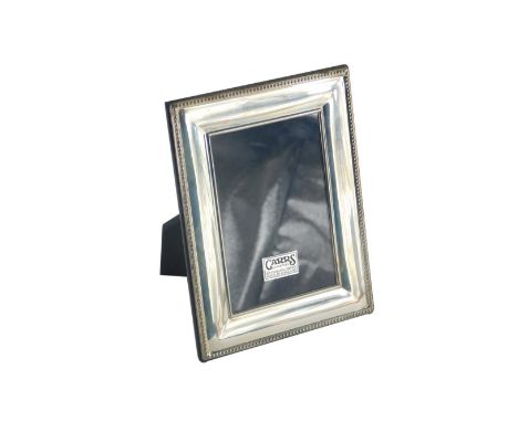 A Carrs Silverware silver photograph frame, of rectangular form with a beaded border, 18cm x 14cm, boxed.