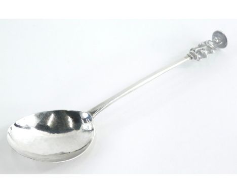 A George II silver apostle spoon, modelled with a cow or bull, London 1738, 1¬oz.