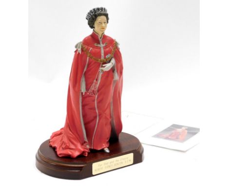 A cold cast porcelain figure of Queen Elizabeth II, sculpted by Timothy Potts, commissioned for holders and medallists of the