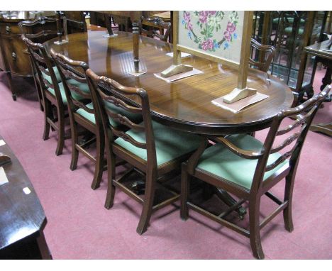 A Reproduction Mahogany Twin Pedestal Dining Table, rounded ends, boxwood stringing on baluster supports, reeded tripod splay