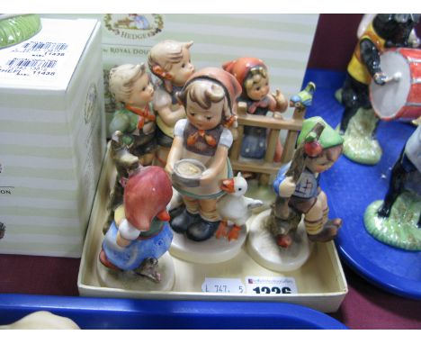 Hummel Pottery Figures, ''Boy and Girl Perched on Branch', 'Girl by Fence', 'Geese Feeding Time', 'Singers', all on oval base