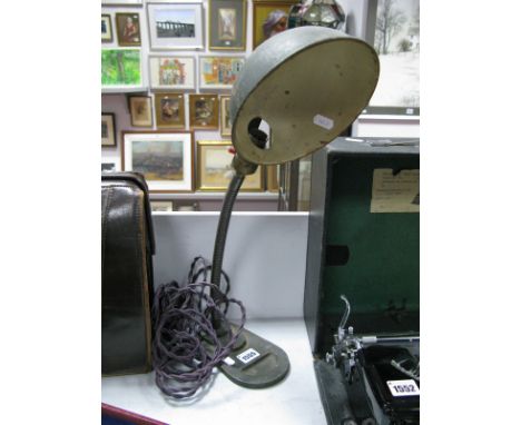 A 1920's/30's Goose Neck Desk Lamp, domed reflector on stepped cast iron base (C.M.C (?) to base) - collectors item only.