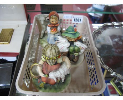 Hummel Pottery Figures, 'Playmates', 'Girl With Lamb' (2), all on circular bases. (3)