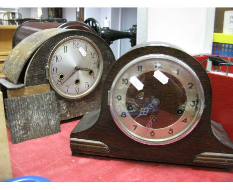A 1920's Oak Cased Mantel Clock, with a silvered dial; together with one other clock. (2)