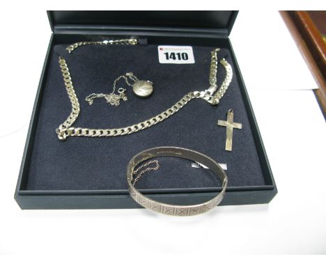 A Hallmarked Silver Bangle, of textured finish; together with a chain, cross and locket pendants, etc.