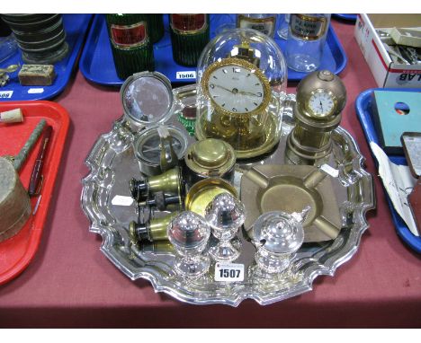 A Knudo Anniversary Clock, opera glasses, three piece EPNS condiment, inkwell, compass, Mansfield Ales ashtray, etc:- (Tray i