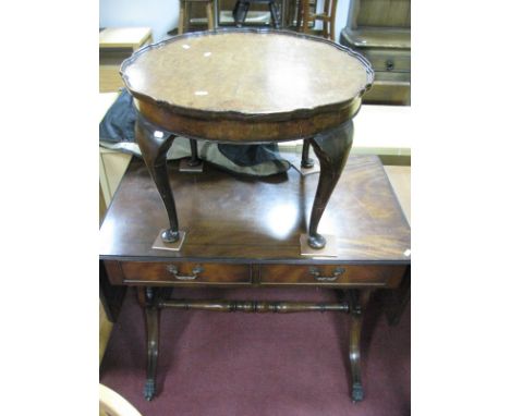 A Mahogany Two Drawer Sofa Table, with fall flaps to lyre ends.