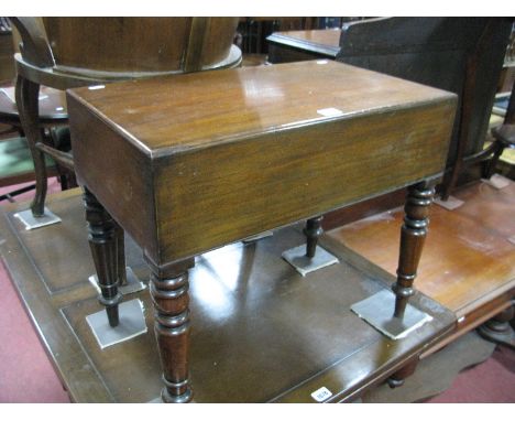 A XIX Century Mahogany Commode, on turned legs.