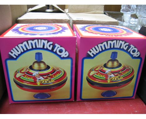 Four Chad Valley 'Sing a Song of Sixpence Humming Tops', all boxed (two seated). (4)