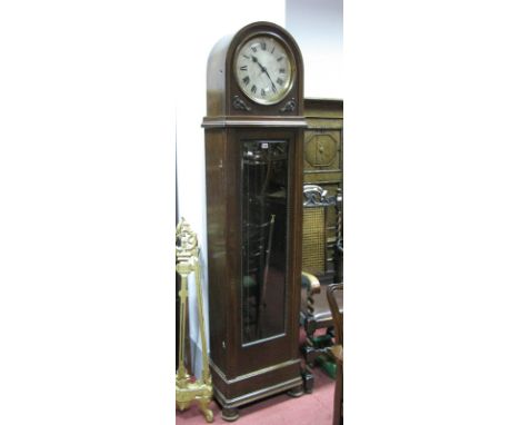 Early XX Century Oak Cased Eight Day Three Weight Longcase Clock, with silvered dial, glazed door, on turned feet.