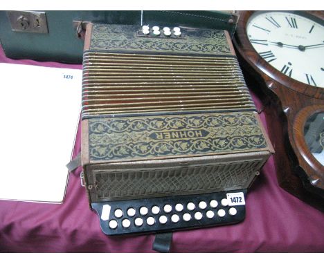 A Vintage Hohner Accordion, twenty-one buttons, plus eight base buttons. 