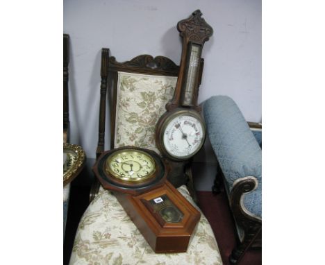 Early XX Century Carved Oak Aneroid Barometer, together with a XIX Century style mahogany cased regulator wall clock. (2)