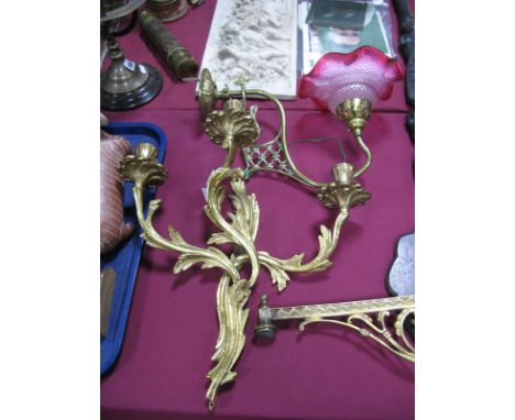 XX Century Brass Wall Bracket, with cranberry glass shade, gilded brass Rococo style three branch wall light, together with a