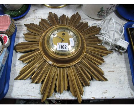 Portuguese Jardiniere, Indian Tree jar, motor cycle posters, sunburst wall clock by Smiths. 