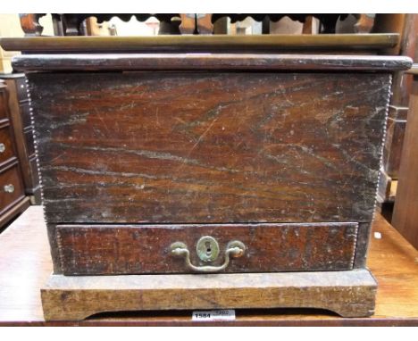 A small 18th century Welsh coffer bach with rising lid over a simple frieze drawer, on bracket supports, 50cm max