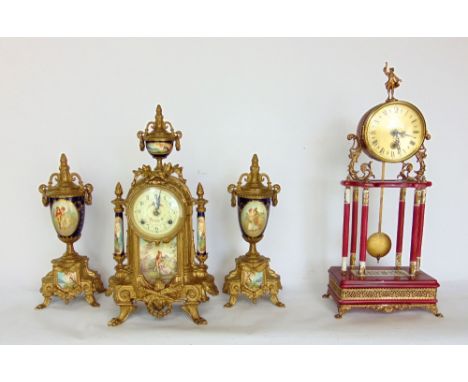 A 19th century style gilt metal clock garniture, the clock with 3.5" two train painted enamel dial, over landscape scenes wit