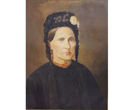 A pair of late 19th century oil paintings on canvas (possibly over painted photographic portraits) one showing a bust length 