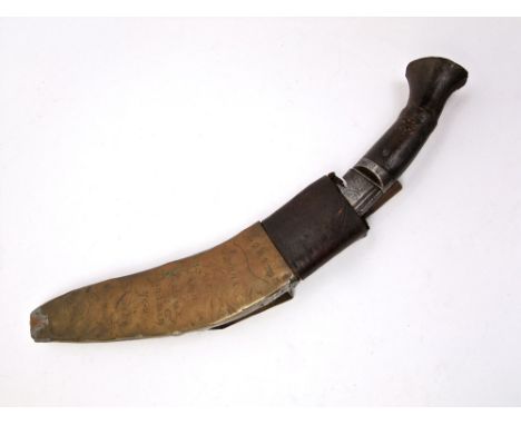 An old Kukri, the brass scabbard with scratched detail Kohima, Imphal, Palet, Shweb, etc