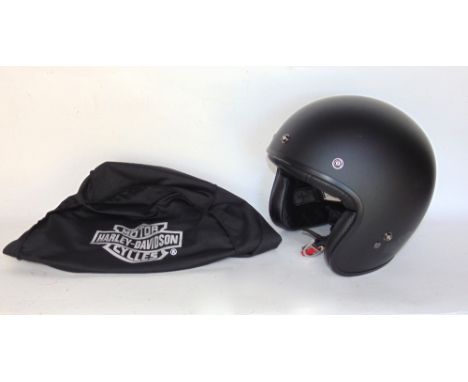 A Harley Davidson motorcycle helmet and carry bag.