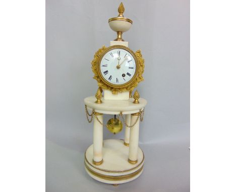 An attractive 19th century English fusee portico clock, the 3" single train enamel dial with Roman numerals upon a white marb