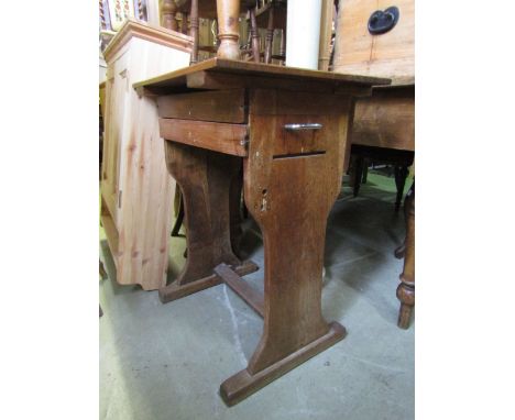 A vintage child's desk with rising lid raised on a stretcher base,  together with a Victorian stripped and waxed pine blanket