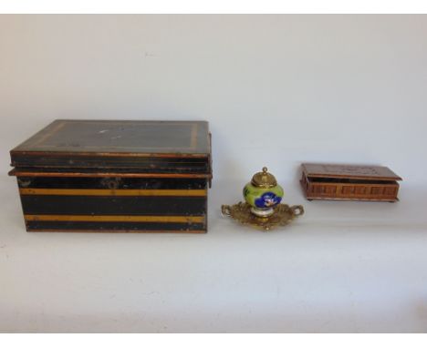 A mixed lot to include a oak music box, Rococo style gilt brass and porcelain standish and japanned tin trunk (3)