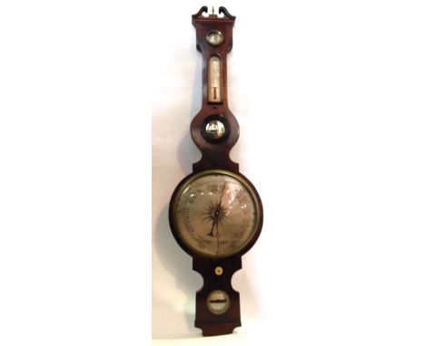A Georgian walnut wheel barometer by C. Cattelli & Son of Hereford, with silvered back plate, 110cm high