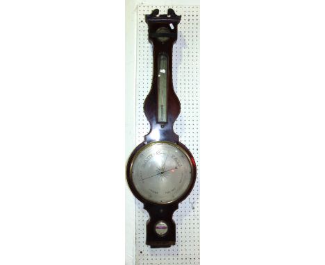 A Georgian mahogany wheel barometer by G Hicks of 12 Upper North Place, Grays Inn Lane, with silvered back plates and mercury
