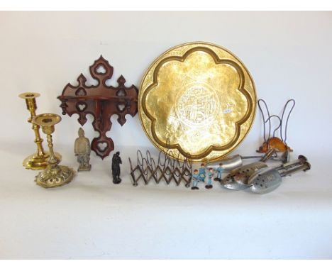 A mixed miscellaneous lot to include two brass candlesticks, a brass charger, a mahogany Gothic wall bracket, plastic models 