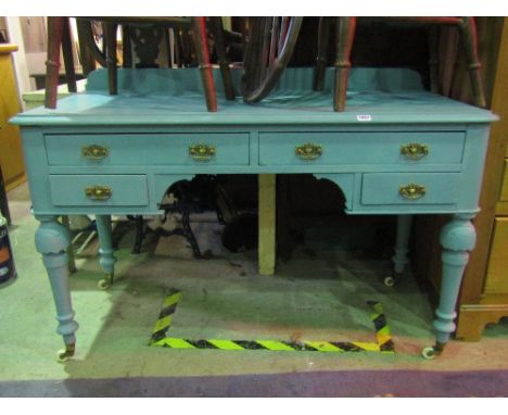 A Victorian kneehole side/dressing table with later blue painted finish, fitted with an arrangement of four frieze drawers ra