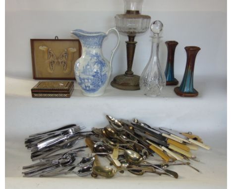 A mixed lot to include a framed taxidermy study of an Atlas Moth, a pair of Bourne Denby pottery candlesticks, an oil lamp, a