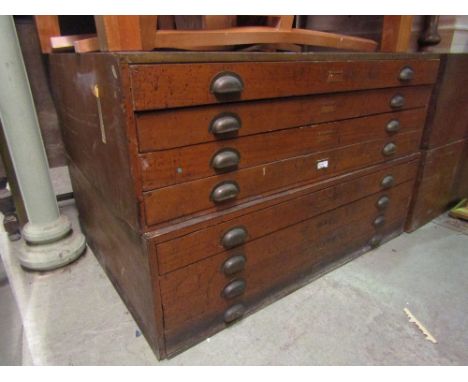 A vintage stained wooden two sectional plan chest fitted with eight index drawers with brass cup handles, 122 cm x 86 cm appr