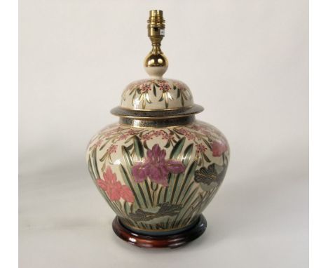 A table lamp, probably by Rochamp, in the Kutani range, in the form of a vase and cover with painted and gilded iris and othe