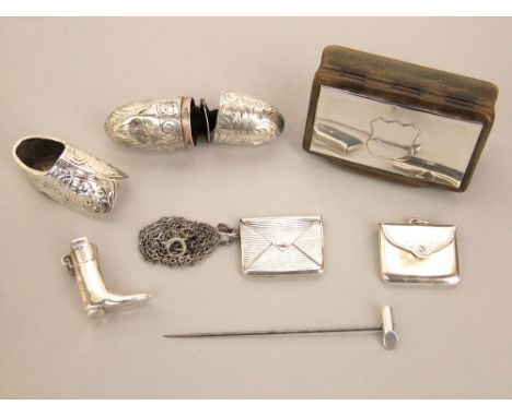 A mixed collection of bijouterie silver to include match stick holder in the form of a boot, two envelope stamp holders, ster