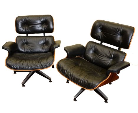 Charles and Ray Eames for Herman Miller - 'Eames Lounge Chair' with leather back, seat and arm rests upon a shaped rosewood v