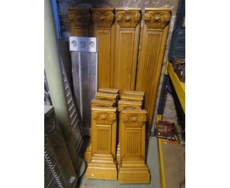 Twelve good quality carved light oak architectural pilasters with fluted columns beneath carved capitals (two sizes), togethe