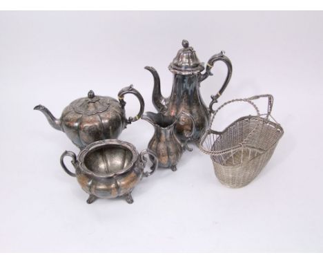 A four piece Victorian silver plated tea service of baluster lobed form together with a further wine basket (5)