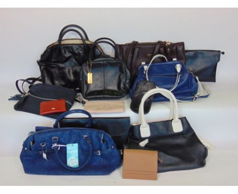 A box containing a collection of vintage hand bags