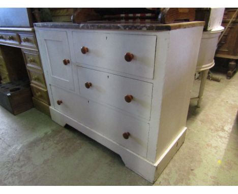 A vintage painted pine washstand with coloured marble top over an arrangement of three drawers and small cupboard raised on b