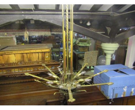 A good quality Art Deco period cast gilt metal and green painted highlighted hanging ceiling light, the long spiral bead twis