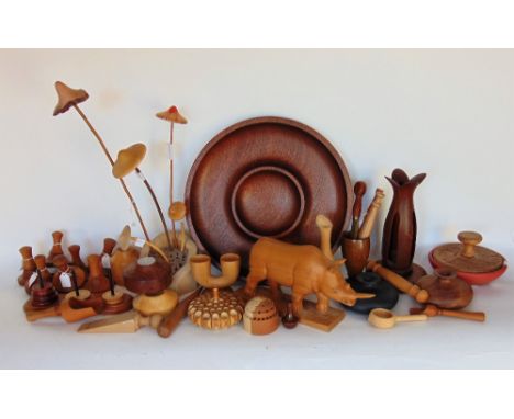 A collection of various treen items to include novelty carved Rhino, toadstools, woodworking tools and others