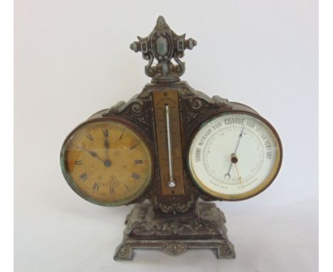 A 19th century cast metal clock barometer/thermometer, fitted with two 3.5" dials flanking a mercury thermometer, 25cm high i